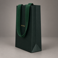Custom 350gsm Dark Green Specialty Paper Bags with Gold Foil Logo & Wide Woven Handles