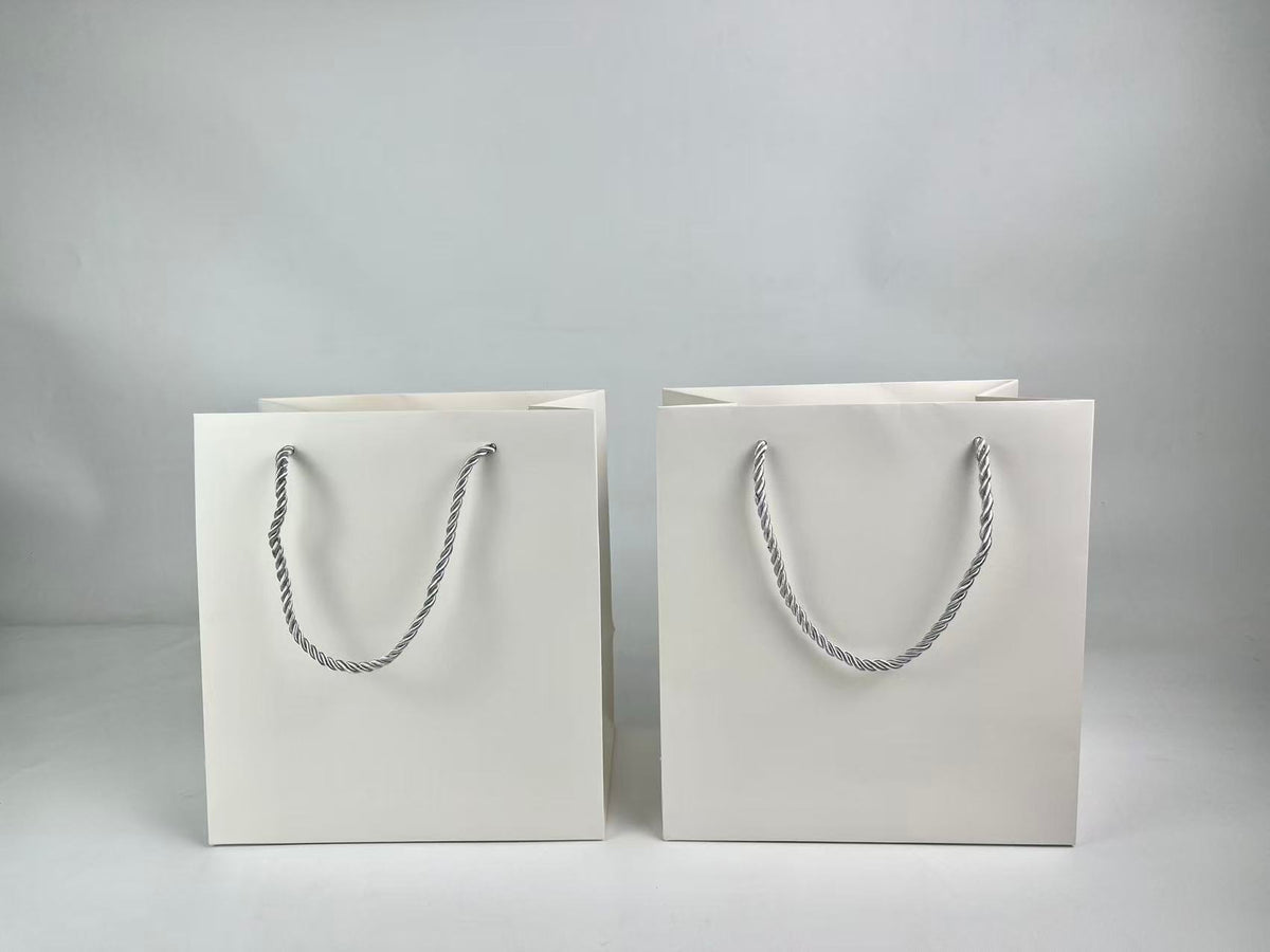 Custom White Paper Gift Bags with Rope Handles | Wholesale & Low MOQ