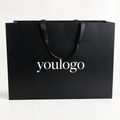 Custom Luxury Black Paper Shopping Bags with Satin Ribbon Handles for Apparel Brands