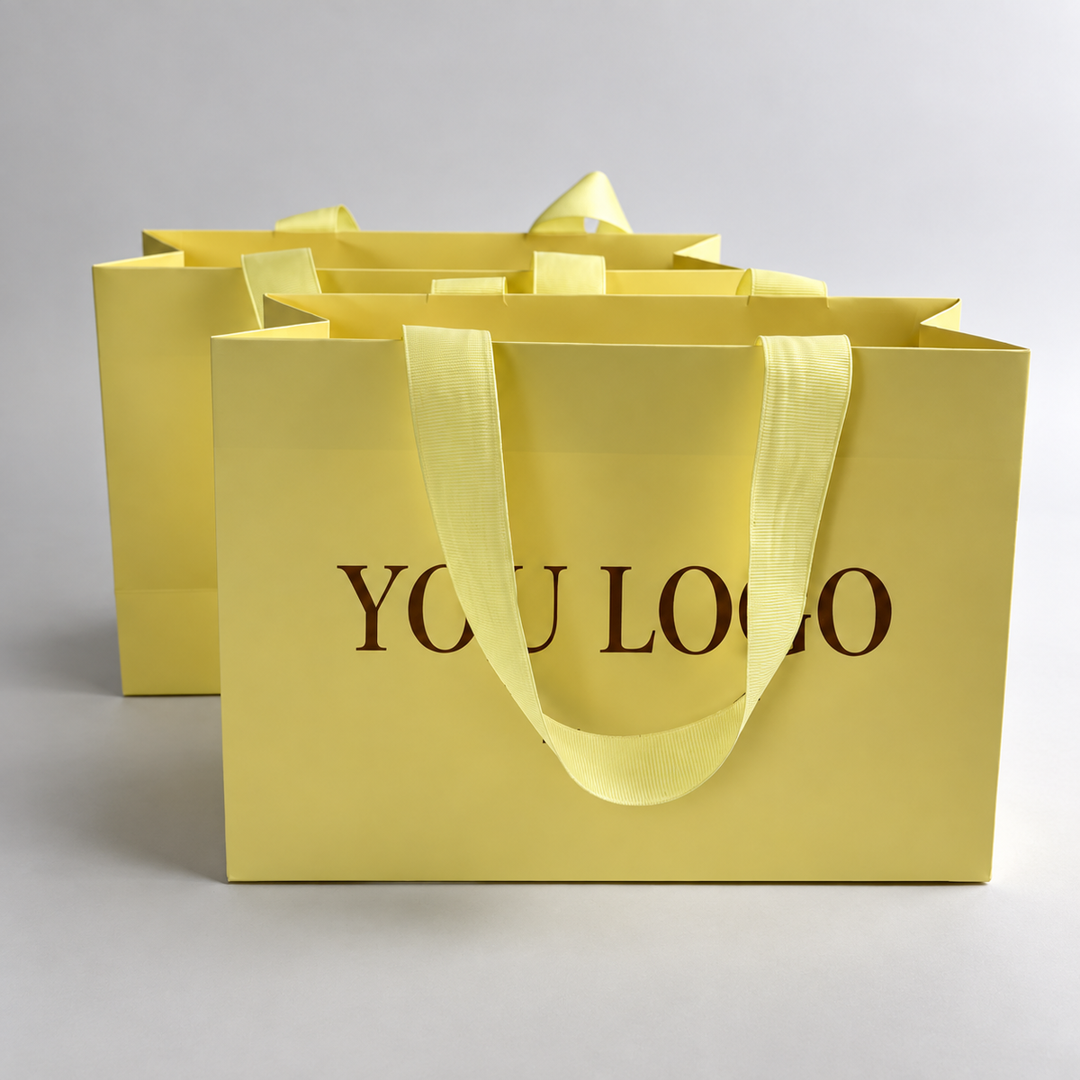 Custom Luxury Yellow Paper Shopping Bags with Ribbon Handles