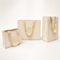 Custom Luxury Paper Bags with Hidden Ribbon Handles – 250GSM Coated Paper Gift Bags with Logo