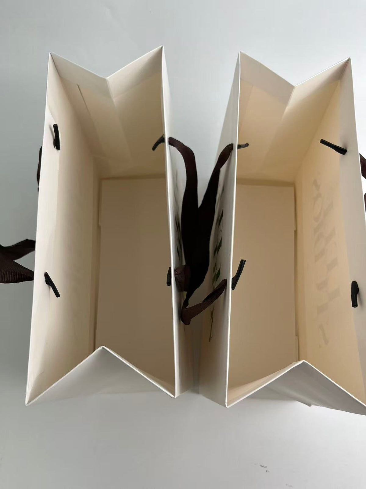 Custom 270gsm Ivory Specialty Paper Shopping Bags with Brown Grosgrain Ribbon Handles
