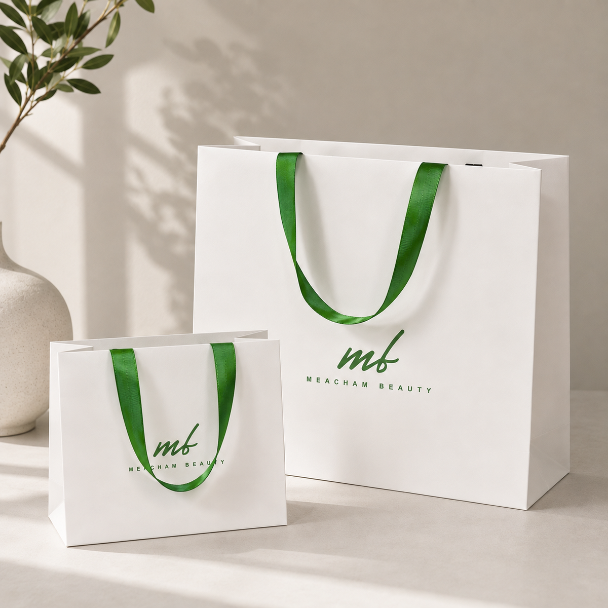 Custom White Paper Shopping Bags with Green Ribbon Handles | MOQ Available for Beauty & Retail Packaging