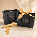 Luxury Custom Black Paper Gift Bags with Gold Foil & Satin Ribbon for Jewelry, Perfume and Event Gifts | Low MOQ