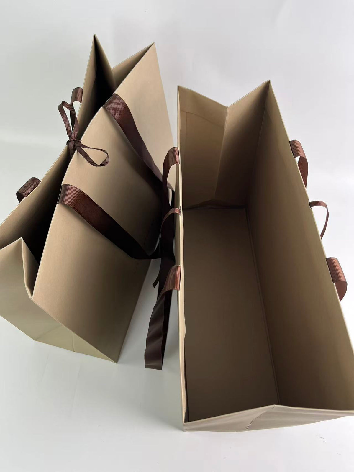 Custom 270gsm Taupe Specialty Paper Shopping Bags with Brown Grosgrain Ribbon Handles