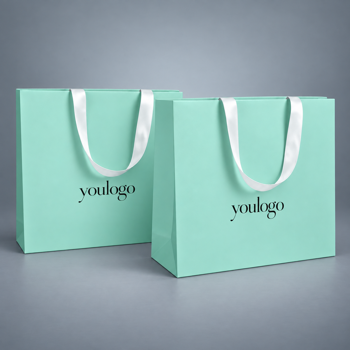 Custom Mint Green 250gsm Paper Shopping Bags with Concealed White Satin Ribbon Handles