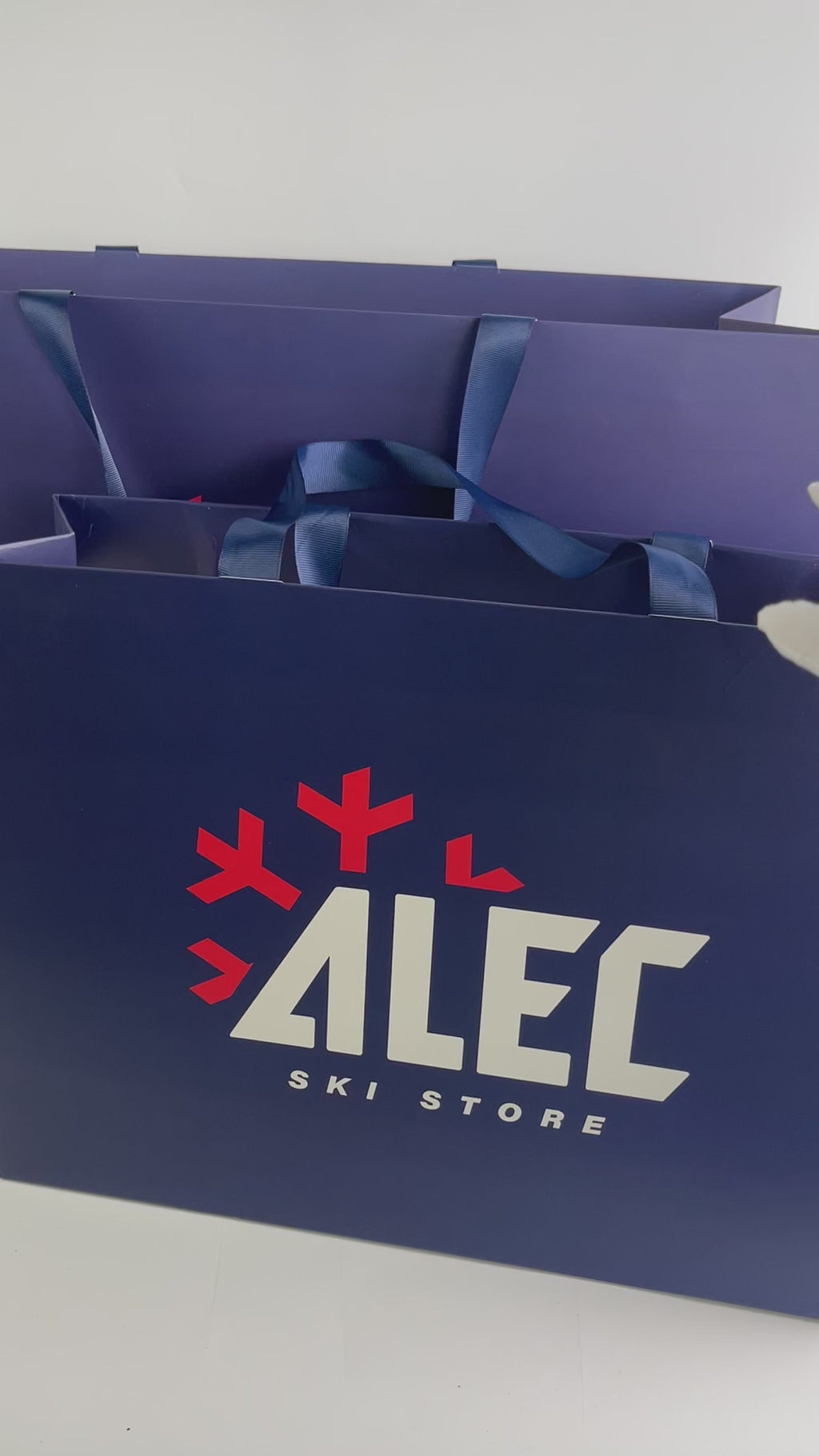 Custom Navy Blue Paper Shopping Bags | Ivory Interior & Satin Ribbon Handles | Luxury Retail Packaging